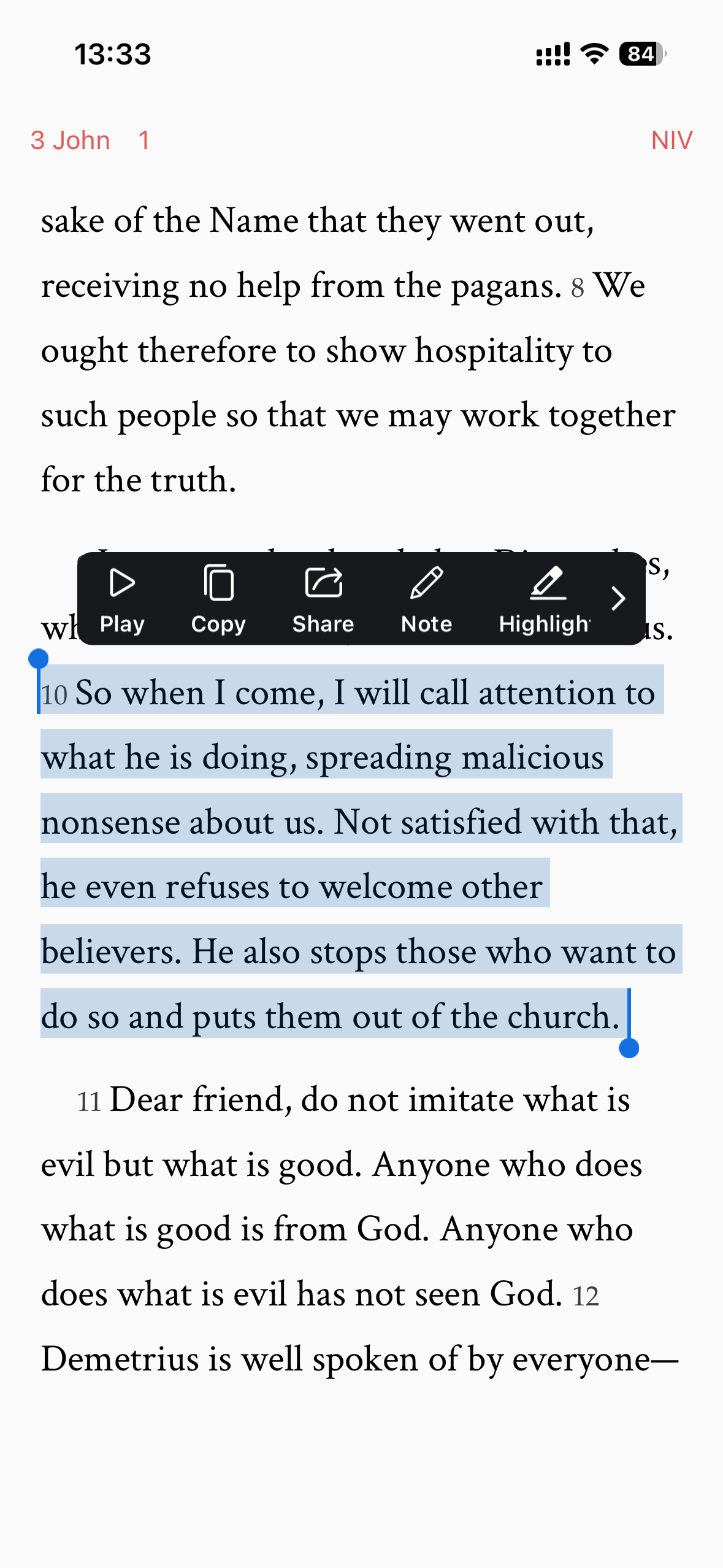 Bible reading on iPhone with a highlight and note toolbar after selecting a verse